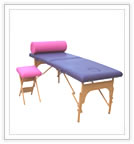 Two section massage table with bolster