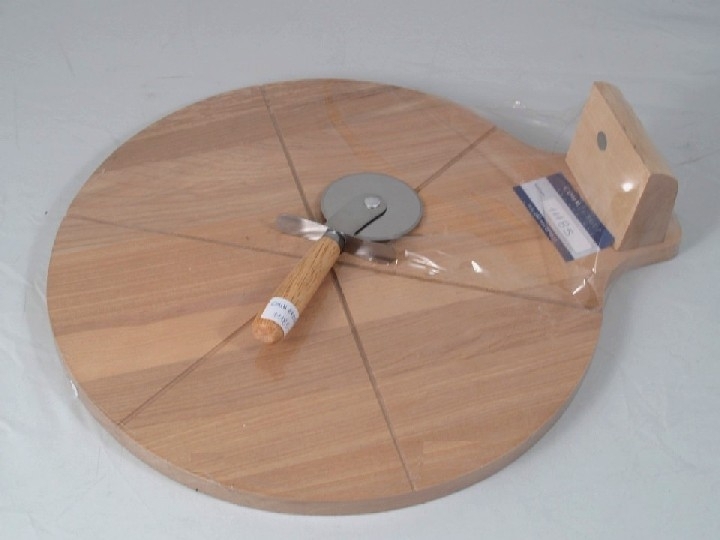 wooden pizza board with cutter
